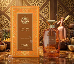 Zenta perfume bottle and packaging on a wooden surface with decorative background